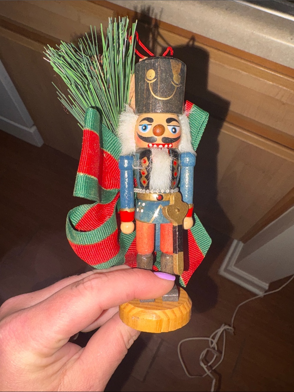 Wooden Nutcracker Ornament with Red & Green Ribbon